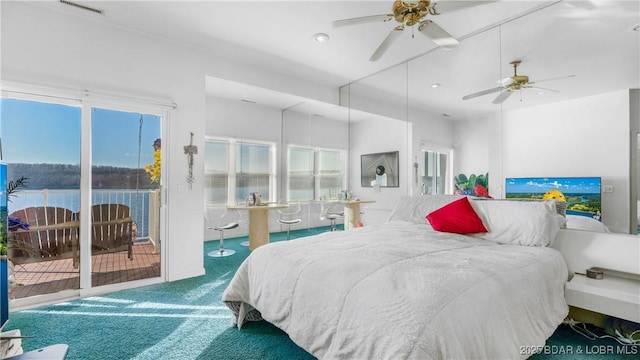 bedroom featuring carpet floors, access to outside, and ceiling fan