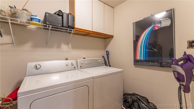 757 Malibu Rd Unit A101, Osage Beach, MO 65065 - laundry room featuring washer and dryer and cabinet space