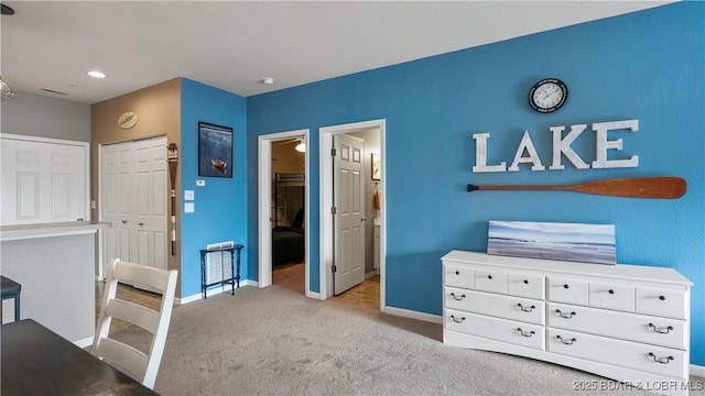 carpeted bedroom featuring a closet