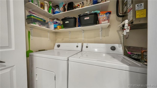 washroom with separate washer and dryer