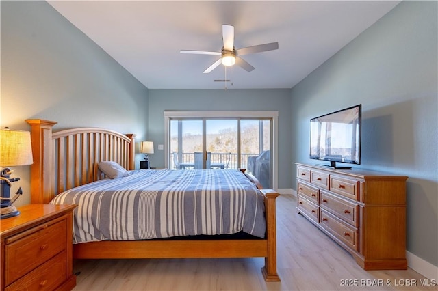 bedroom with baseboards, light wood-type flooring, visible vents, and access to exterior