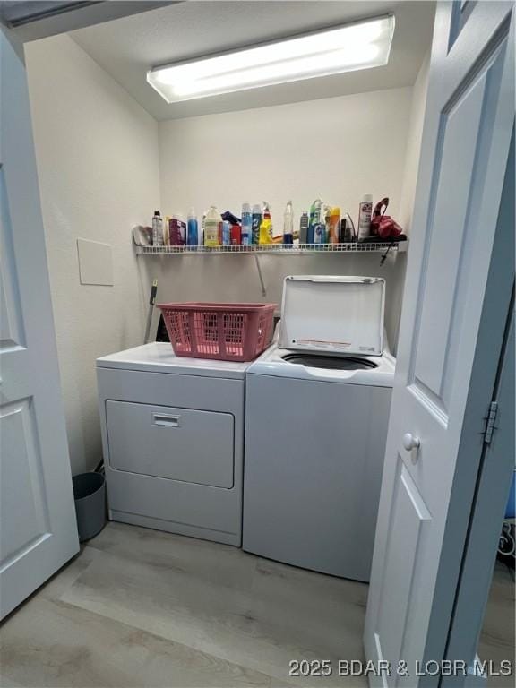 laundry area featuring separate washer and dryer