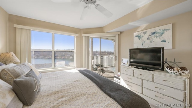 bedroom with access to exterior and ceiling fan