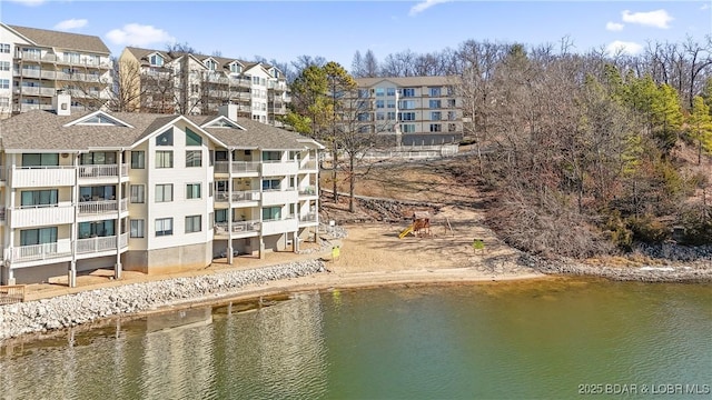 drone / aerial view with a water view