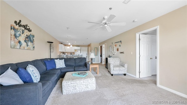 1481 Ledges Dr Unit C23, Osage Beach, MO 65065 - living room featuring ceiling fan, light colored carpet, and baseboards