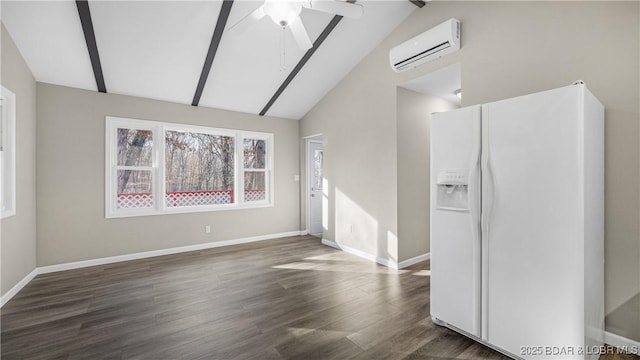 27436 Eola Ln, Rocky Mount, MO 65072 - unfurnished living room featuring ceiling fan, vaulted ceiling with beams, a wall mounted AC, and dark hardwood / wood-style flooring
