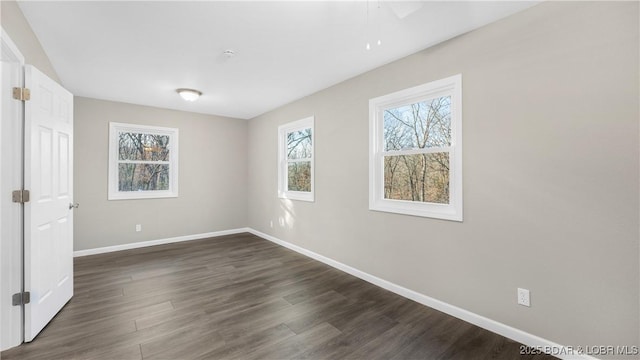 27436 Eola Ln, Rocky Mount, MO 65072 - unfurnished room with dark wood-type flooring