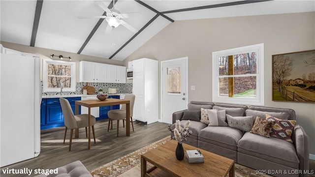 27436 Eola Ln, Rocky Mount, MO 65072 - living room with sink, beam ceiling, dark wood-type flooring, and ceiling fan