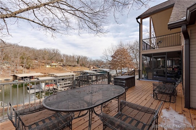 deck featuring a water view