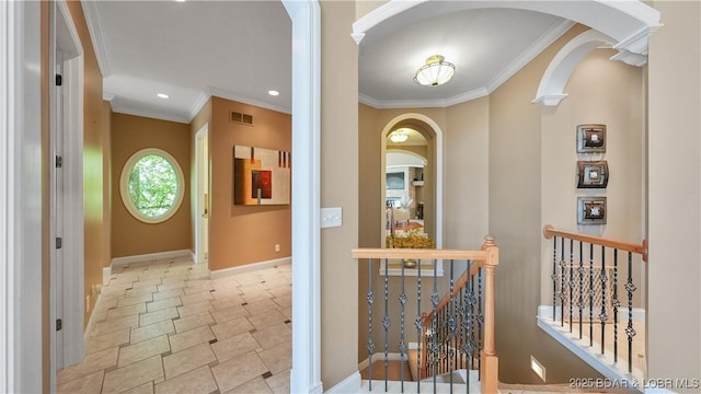 corridor with crown molding