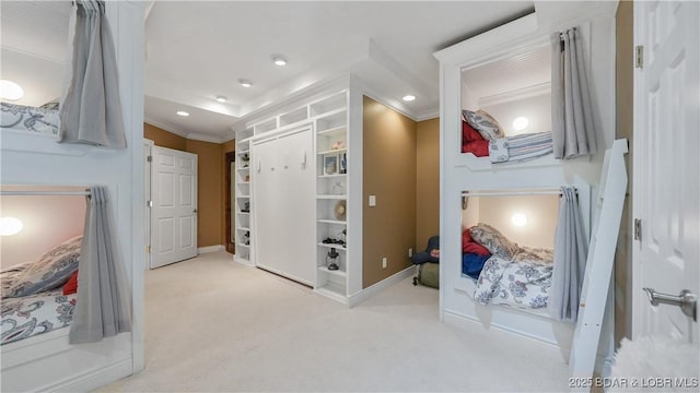 hall with carpet floors and ornamental molding