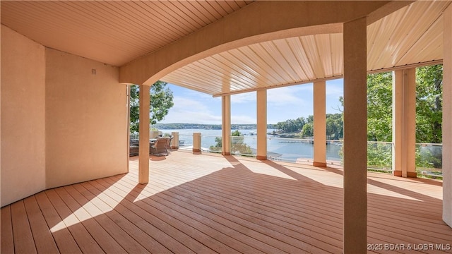 deck featuring a water view