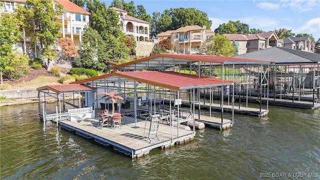 view of dock with a water view