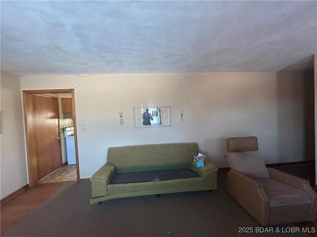 living room with a textured ceiling