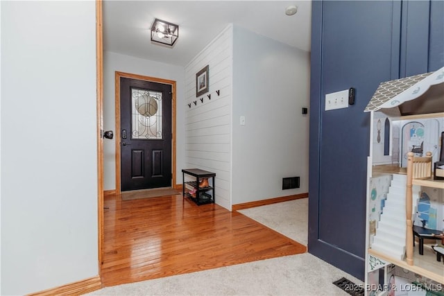 foyer featuring light wood-type flooring