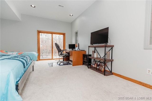 carpeted bedroom featuring access to outside