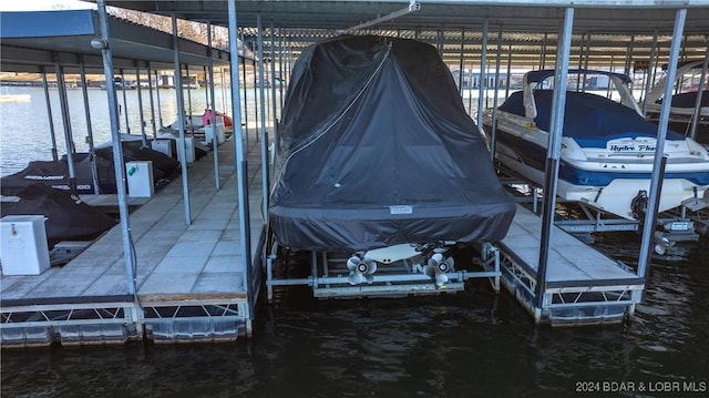 view of dock with a water view