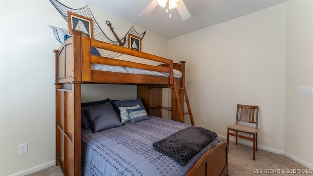 bedroom with light colored carpet