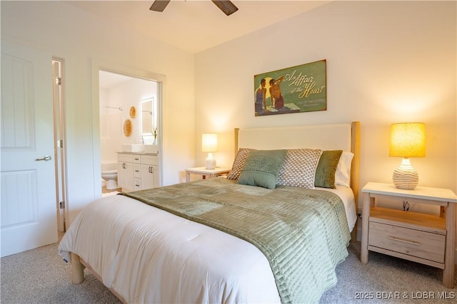 carpeted bedroom featuring connected bathroom and ceiling fan