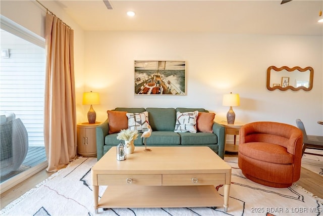 living room with light hardwood / wood-style flooring