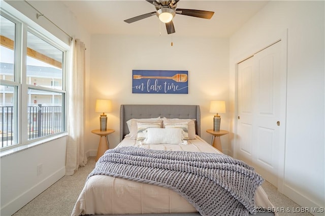 bedroom with ceiling fan and carpet flooring