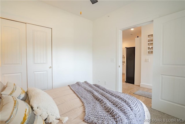 bedroom with light hardwood / wood-style flooring