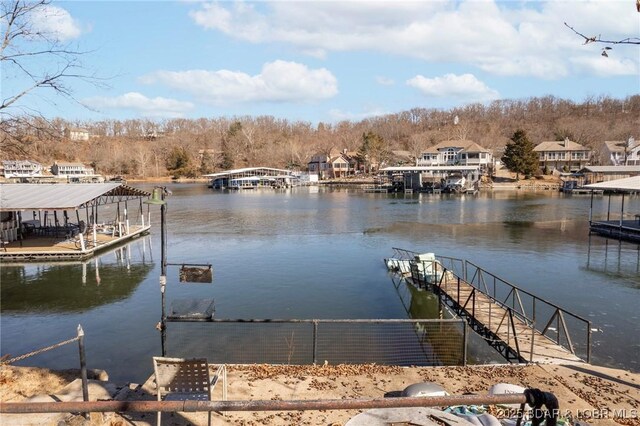 view of dock with a water view