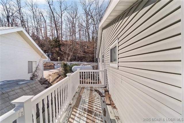 view of property exterior featuring a deck