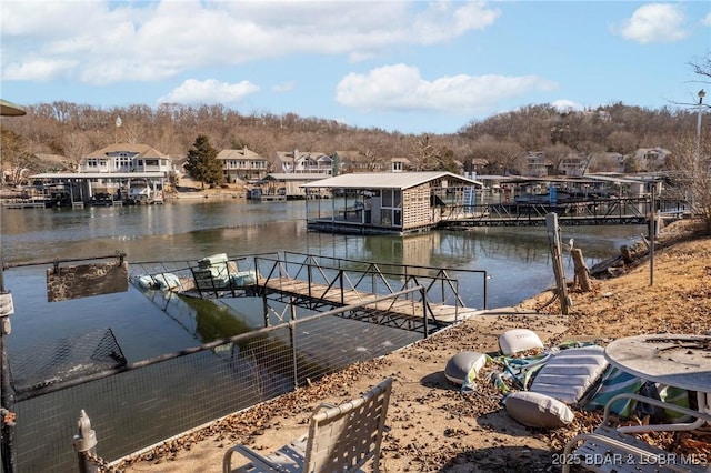 view of dock with a water view