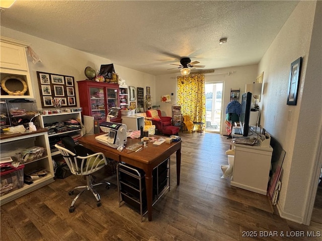 office featuring ceiling fan, a textured ceiling, and dark hardwood / wood-style flooring