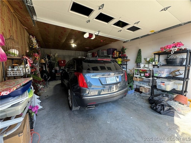 garage featuring a garage door opener