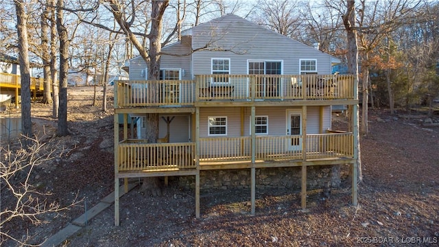 rear view of house with a deck