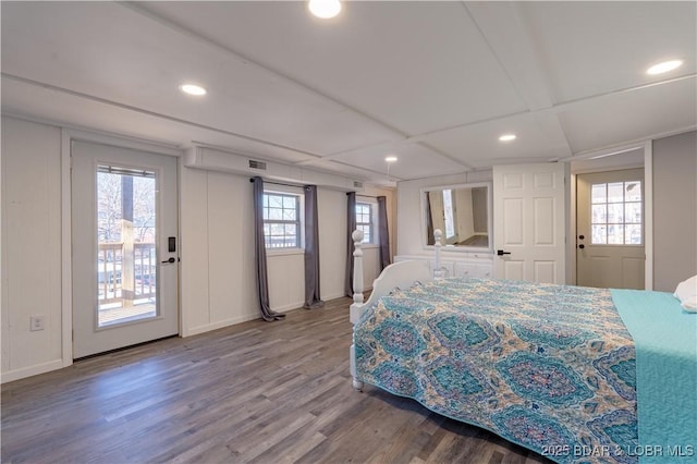 bedroom featuring hardwood / wood-style flooring and access to exterior