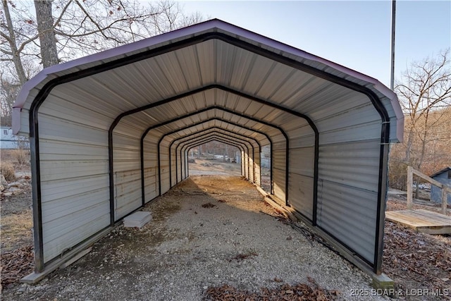 view of outbuilding with a carport