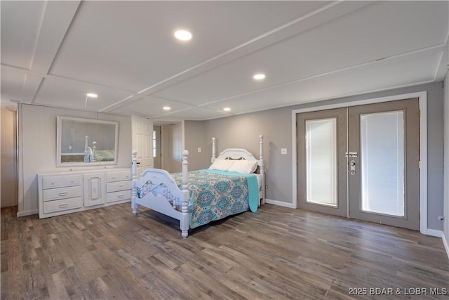 bedroom with french doors and wood-type flooring