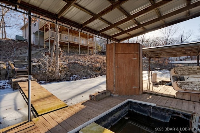 view of snow covered deck