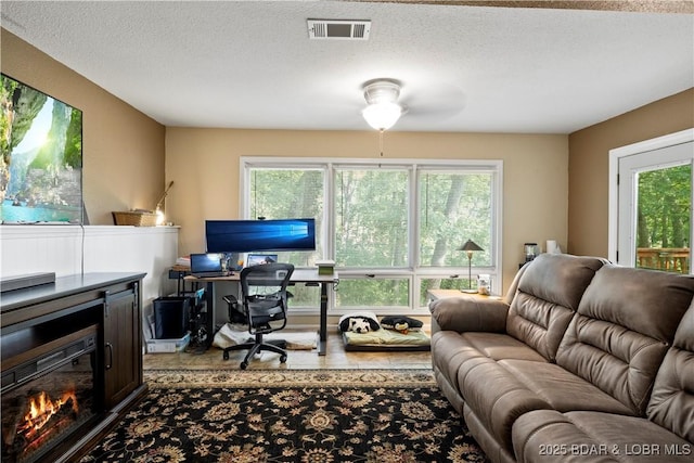 office area featuring a textured ceiling