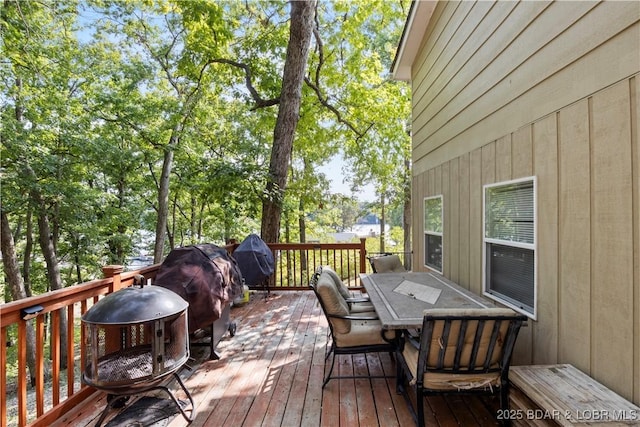 wooden deck with area for grilling