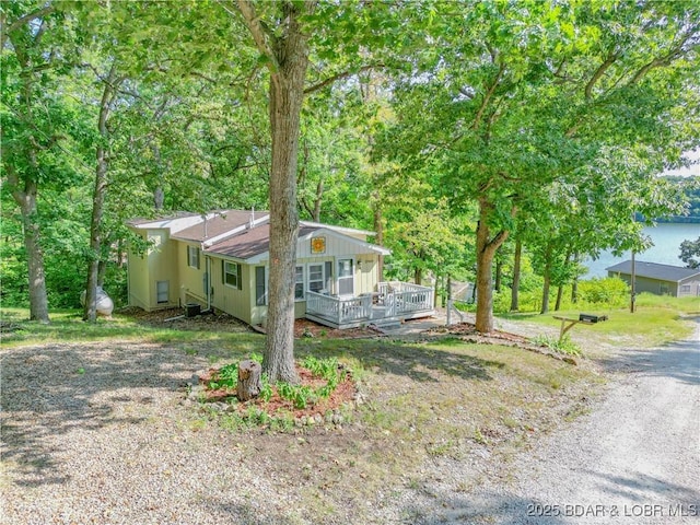 view of front of property featuring a wooden deck