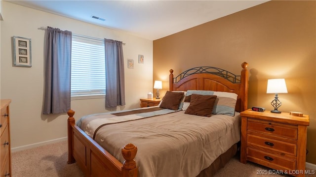 bedroom with light carpet