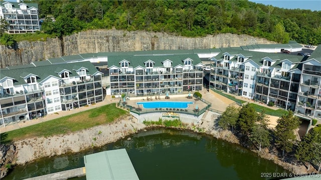 drone / aerial view with a water view