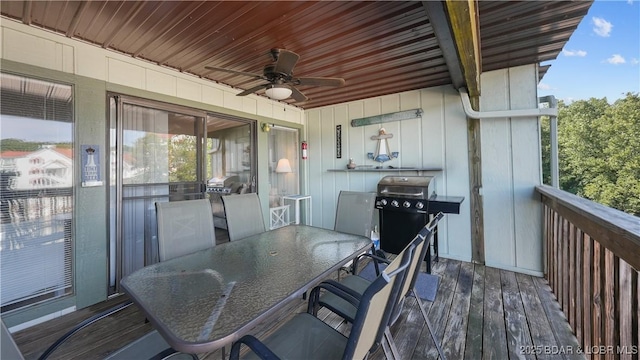 wooden terrace featuring ceiling fan and area for grilling