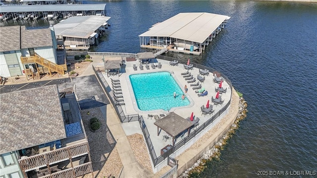 birds eye view of property featuring a water view