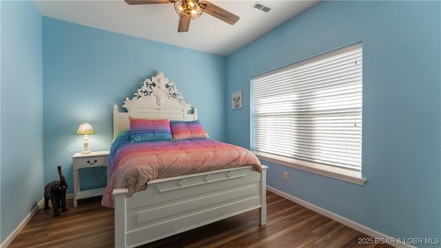 bedroom featuring dark wood-type flooring and ceiling fan