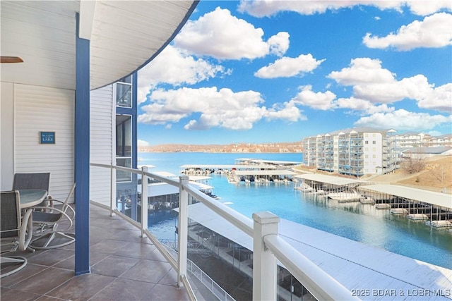 balcony featuring a water view