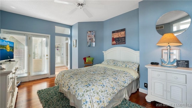 bedroom with multiple windows, wood-type flooring, and ceiling fan