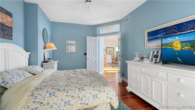 bedroom featuring dark wood-type flooring and ceiling fan