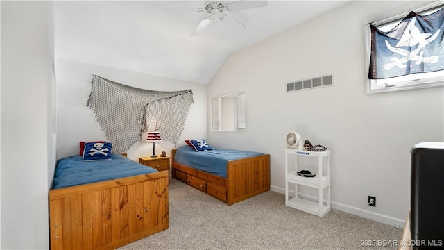 carpeted bedroom featuring vaulted ceiling and ceiling fan