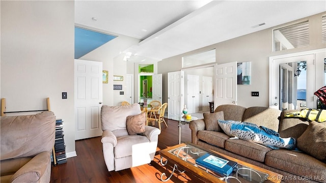 living room with dark hardwood / wood-style flooring