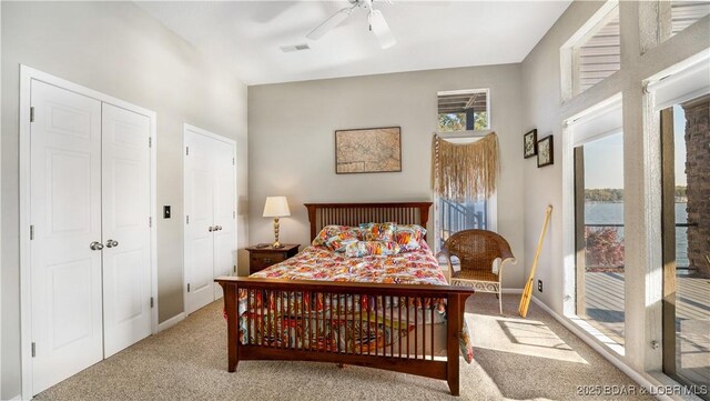 bedroom with light colored carpet and ceiling fan